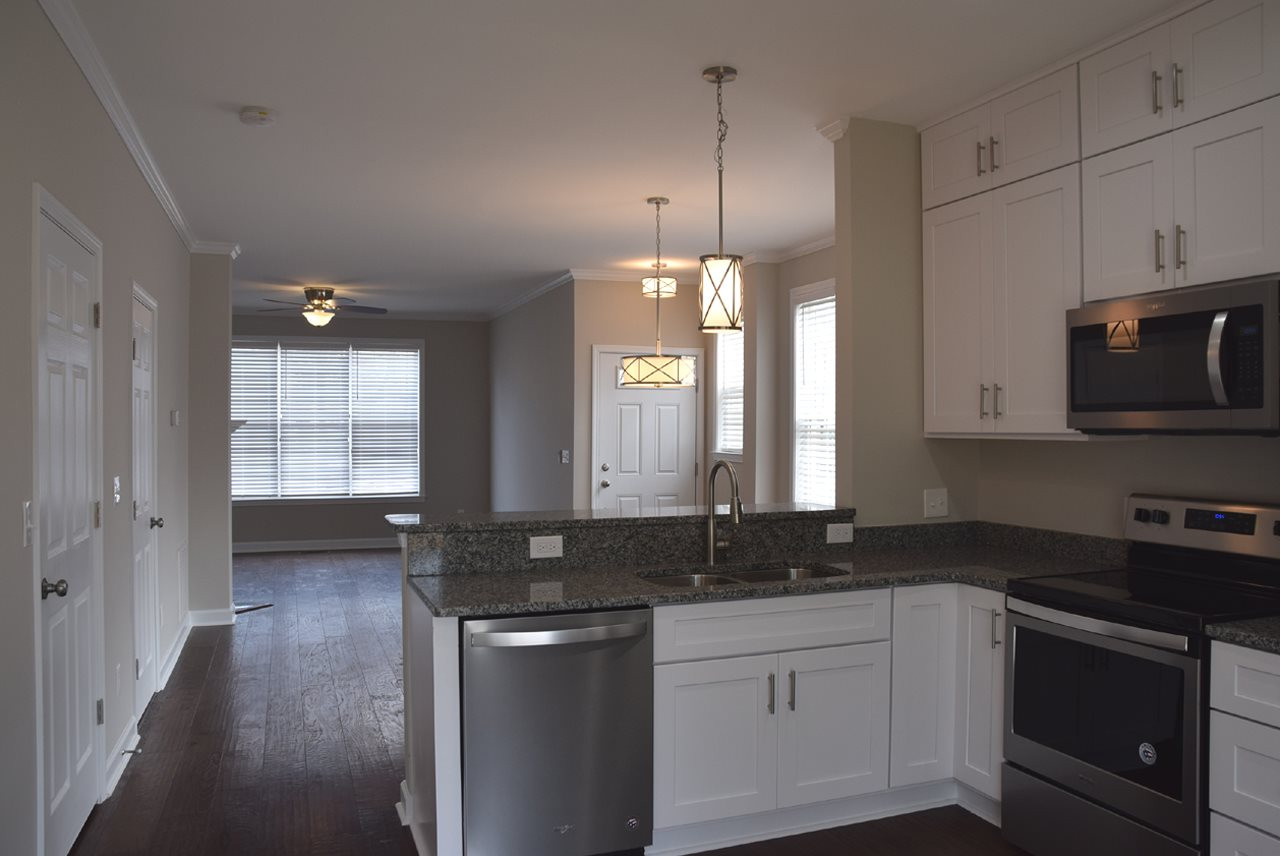 8411 Reedy Ridge Lane Raleigh, NC 27613 - Photo 3 of 30 Kitchen to Family Room
