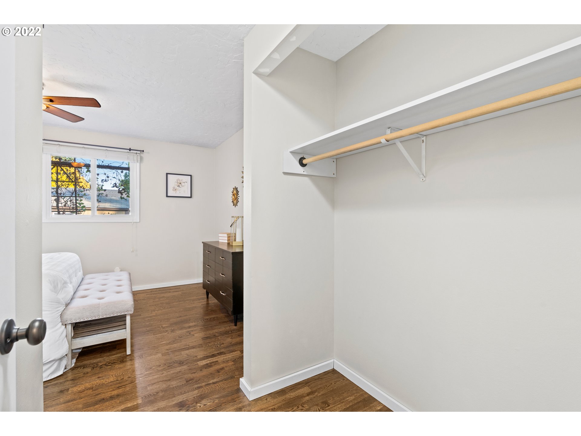 6920 Southwest Briarcliff Circle Beaverton, OR 97008 - Photo 22 of 32 a living room with furniture and a wooden floor