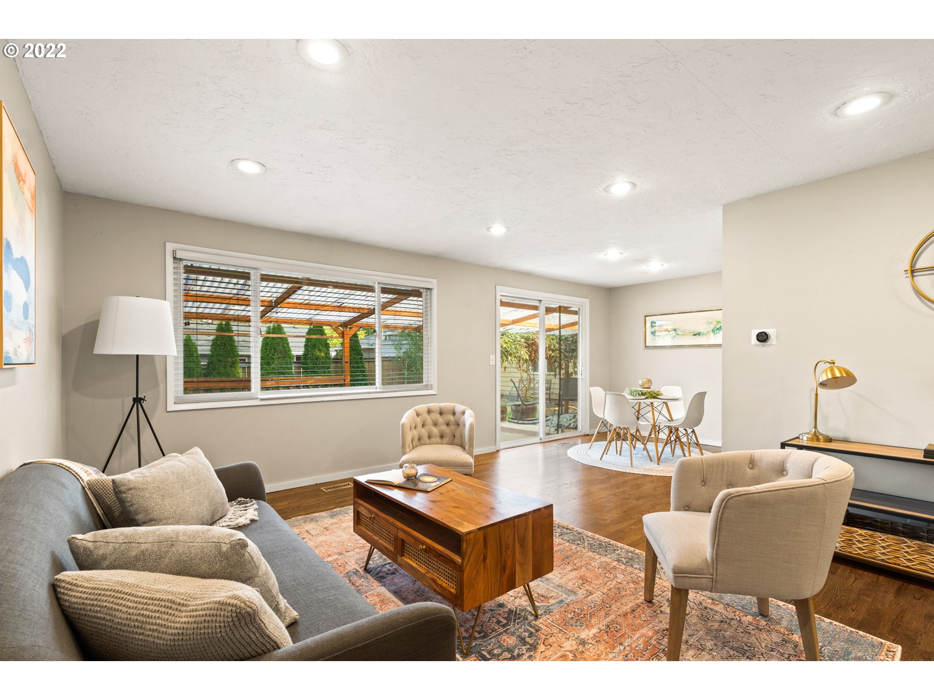6920 Southwest Briarcliff Circle Beaverton, OR 97008 - Photo 6 of 32 a living room with furniture and a large window
