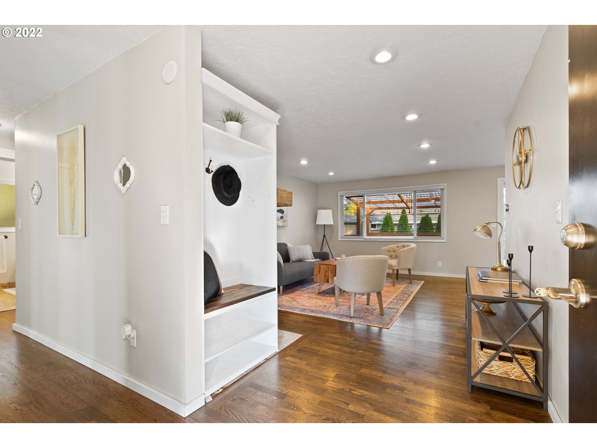 6920 Southwest Briarcliff Circle Beaverton, OR 97008 - Photo 7 of 32 a living room with furniture and a large window