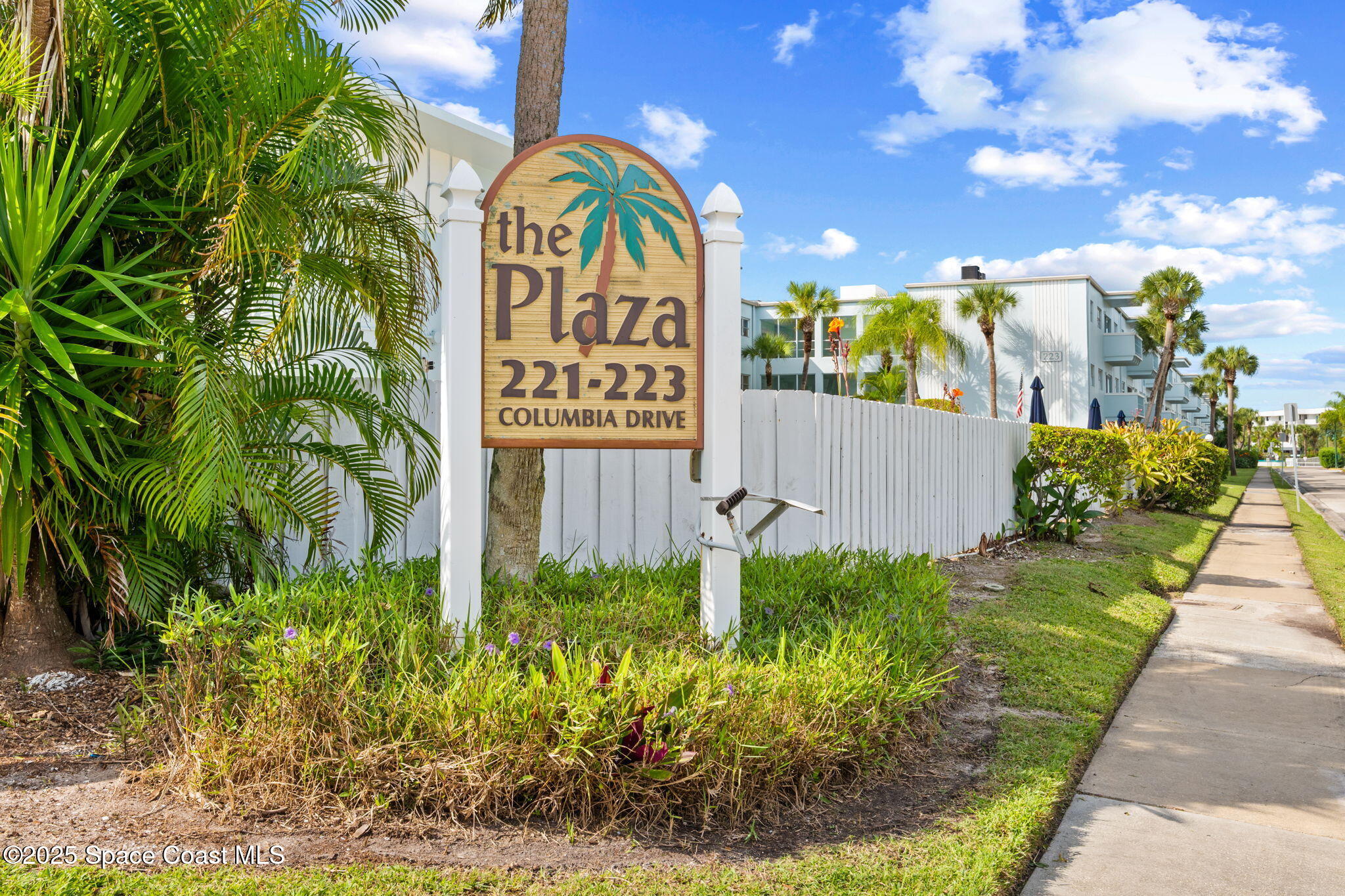 221 Columbia Drive, Unit 343 Cape Canaveral, FL 32920 - Photo 22 of 22 a view of a sign board with potted plants