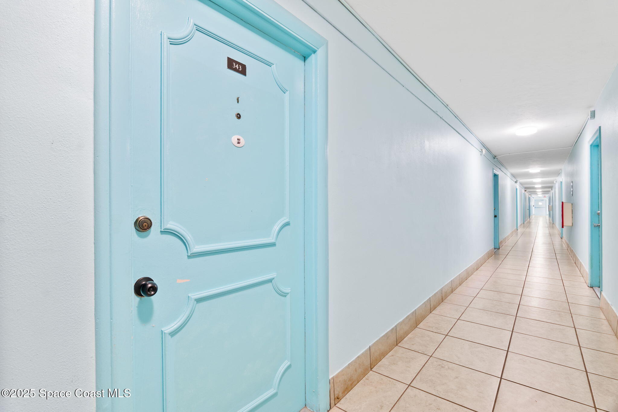 221 Columbia Drive, Unit 343 Cape Canaveral, FL 32920 - Photo 5 of 22 a view of a hallway