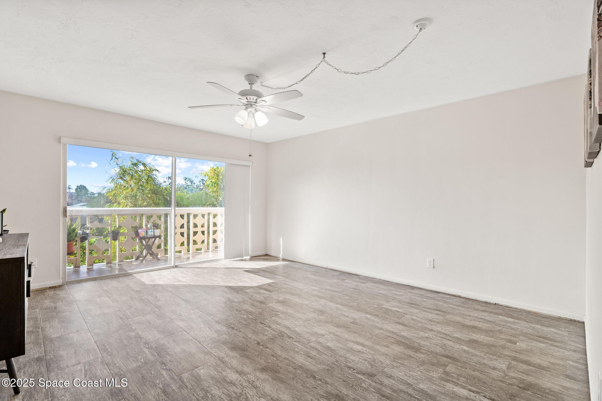221 Columbia Drive, Unit 343 Cape Canaveral, FL 32920 - Photo 10 of 22 a view of an empty room with a window
