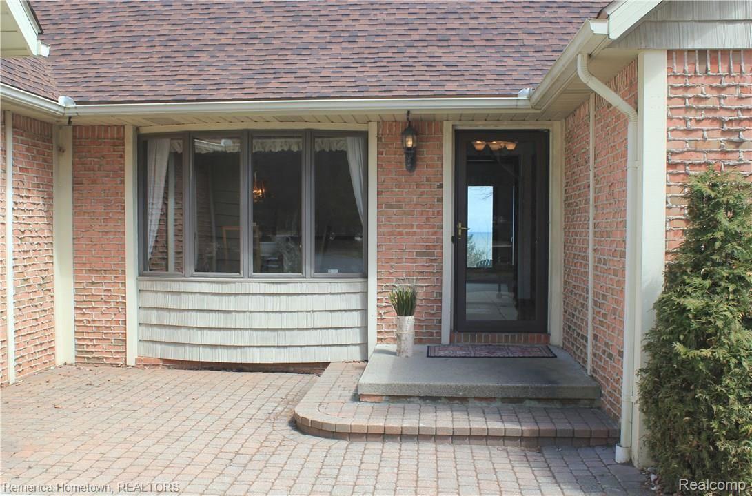 Brick paver entryway perfect for a sitting area