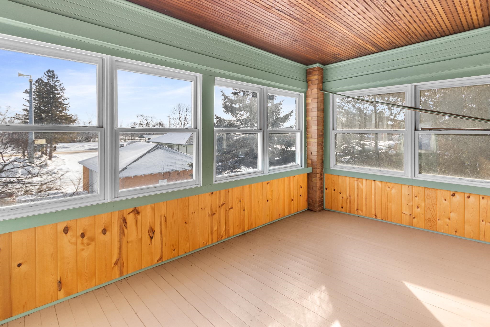 6494 School Street Finlayson, MN 55735 - Photo 19 of 32 Unfurnished sunroom with wooden walls, wooden ceiling, and wood-type flooring