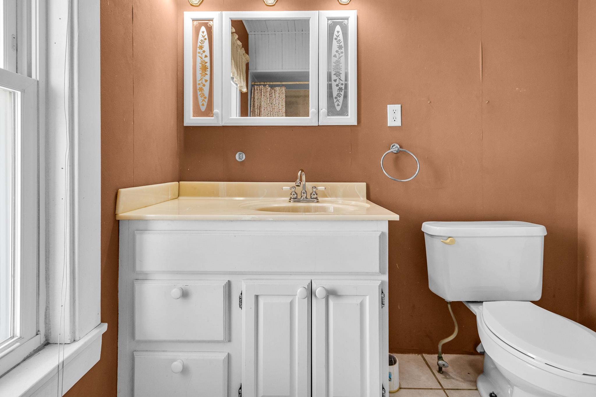 6494 School Street Finlayson, MN 55735 - Photo 27 of 32 Bathroom with vanity, curtained shower, and tile patterned floors