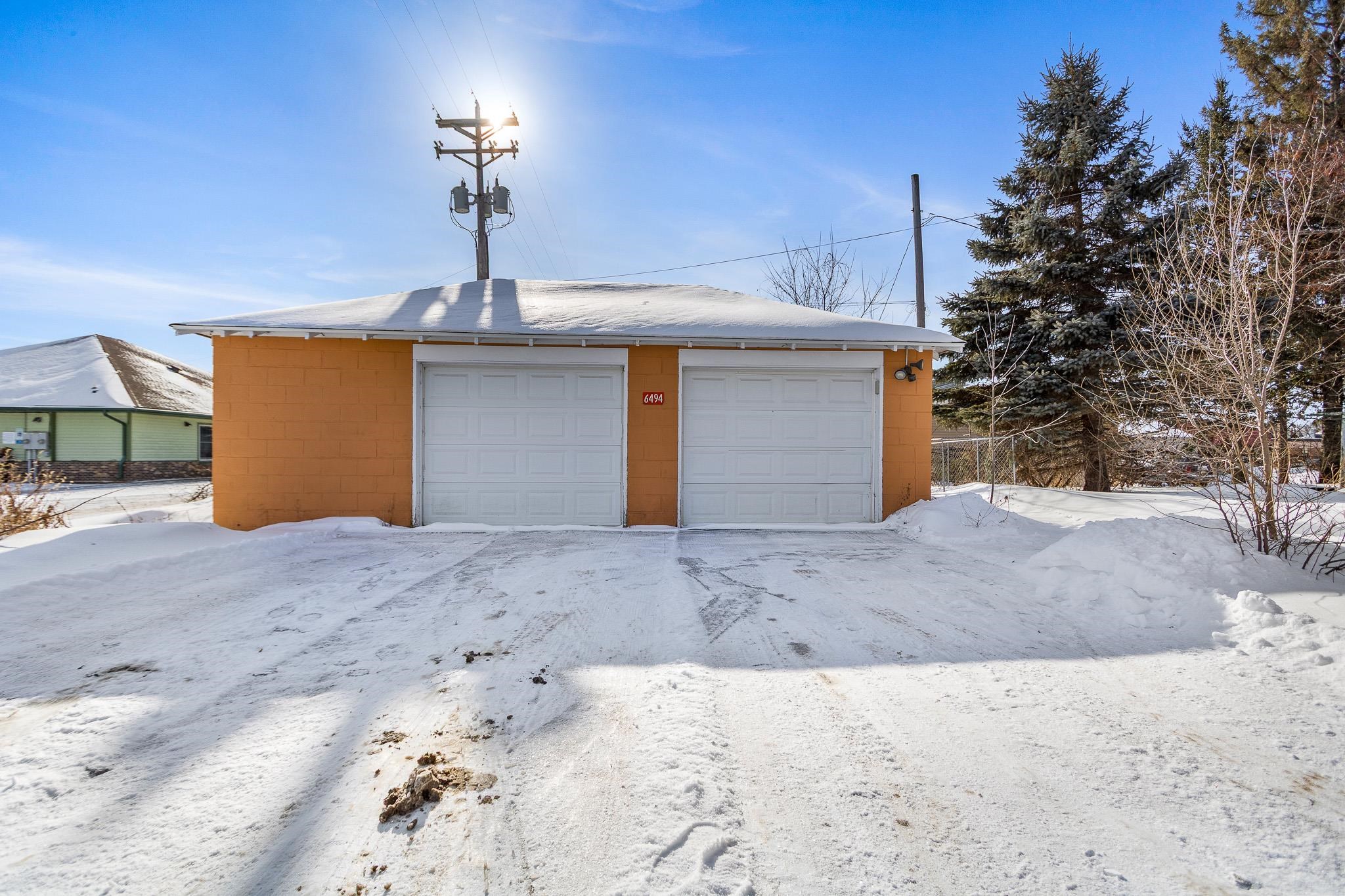 6494 School Street Finlayson, MN 55735 - Photo 3 of 32 Snow covered garage featuring a detached garage