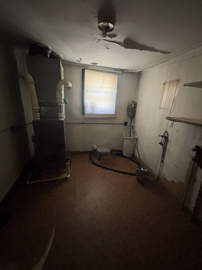 2458 South 12600E Road Pembroke Township, IL 60958 - Photo 14 of 16 view of a room with gym equipment and windows