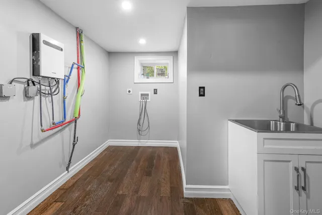 a view of a livingroom with wooden floor