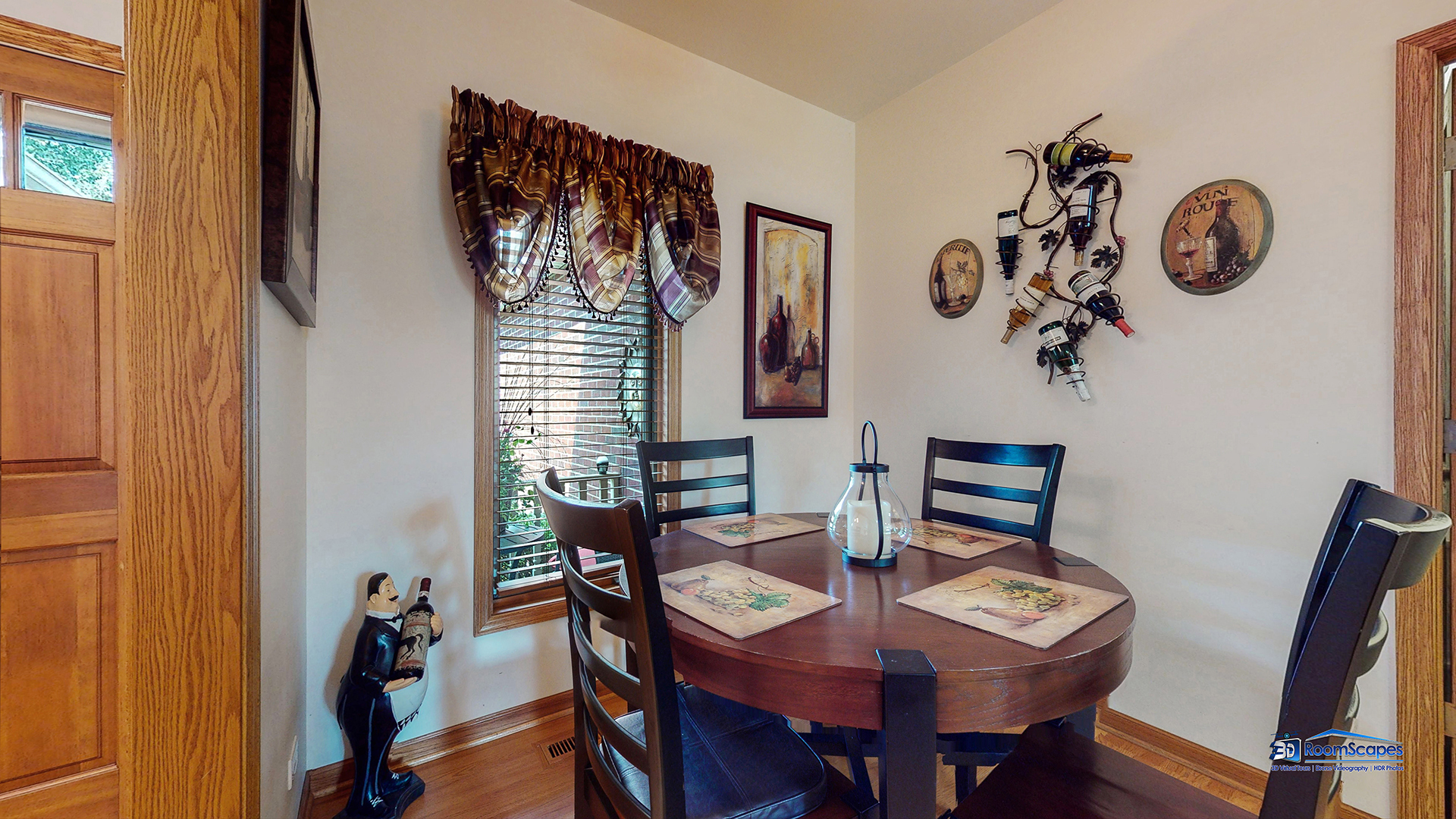 7202 Lone Oak Road Spring Grove, IL 60081 - Photo 16 of 59 a view of a dining room with furniture and wooden floor