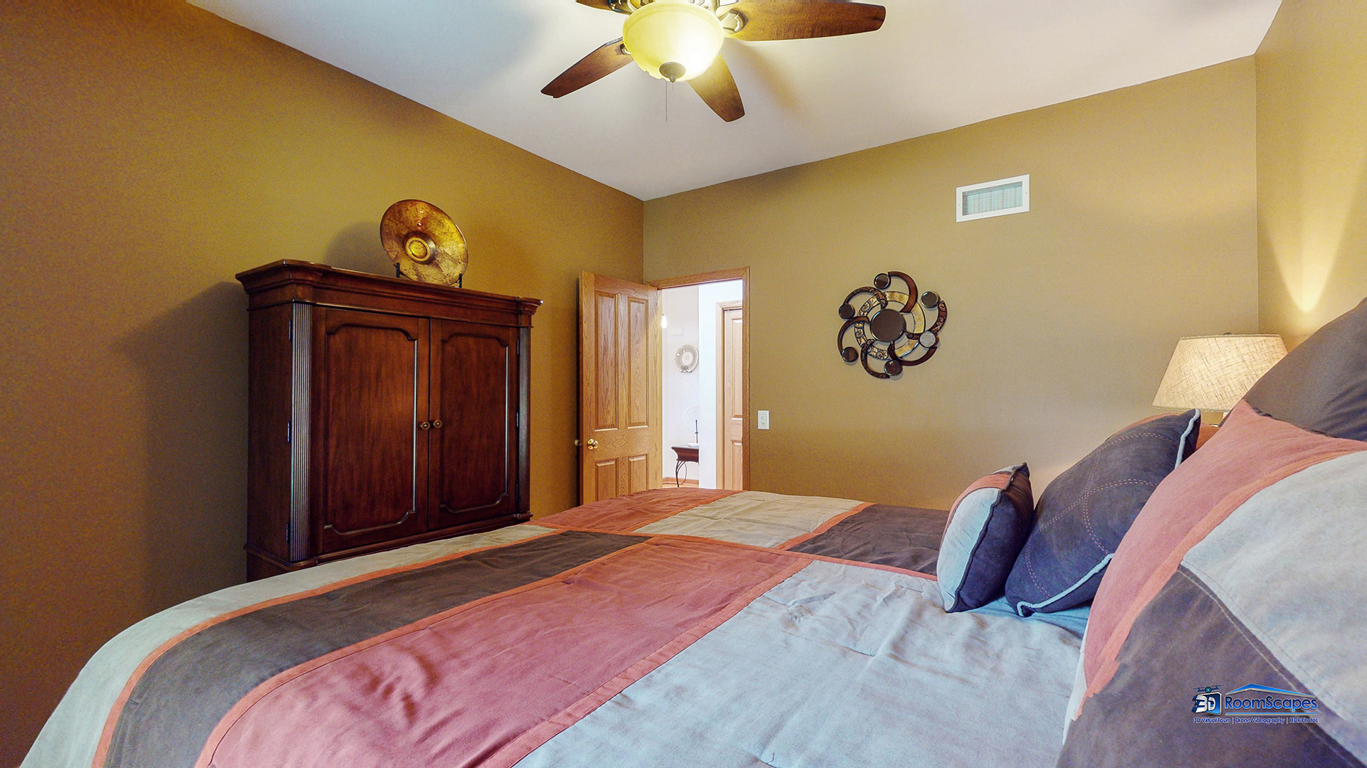 7202 Lone Oak Road Spring Grove, IL 60081 - Photo 27 of 59 a bedroom with a bed and a chandelier