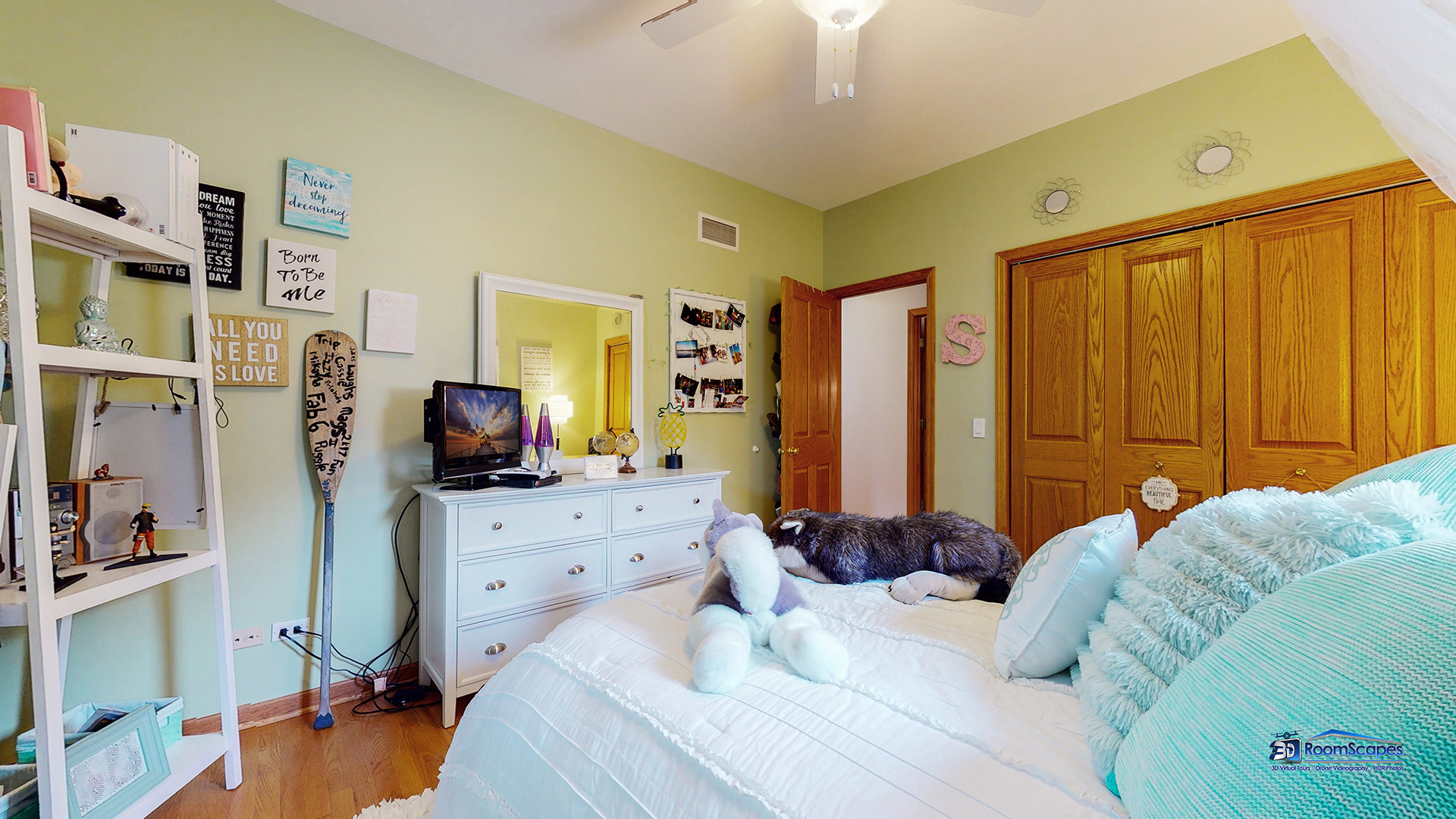 7202 Lone Oak Road Spring Grove, IL 60081 - Photo 33 of 59 a bed room with a bed window and a flat screen tv