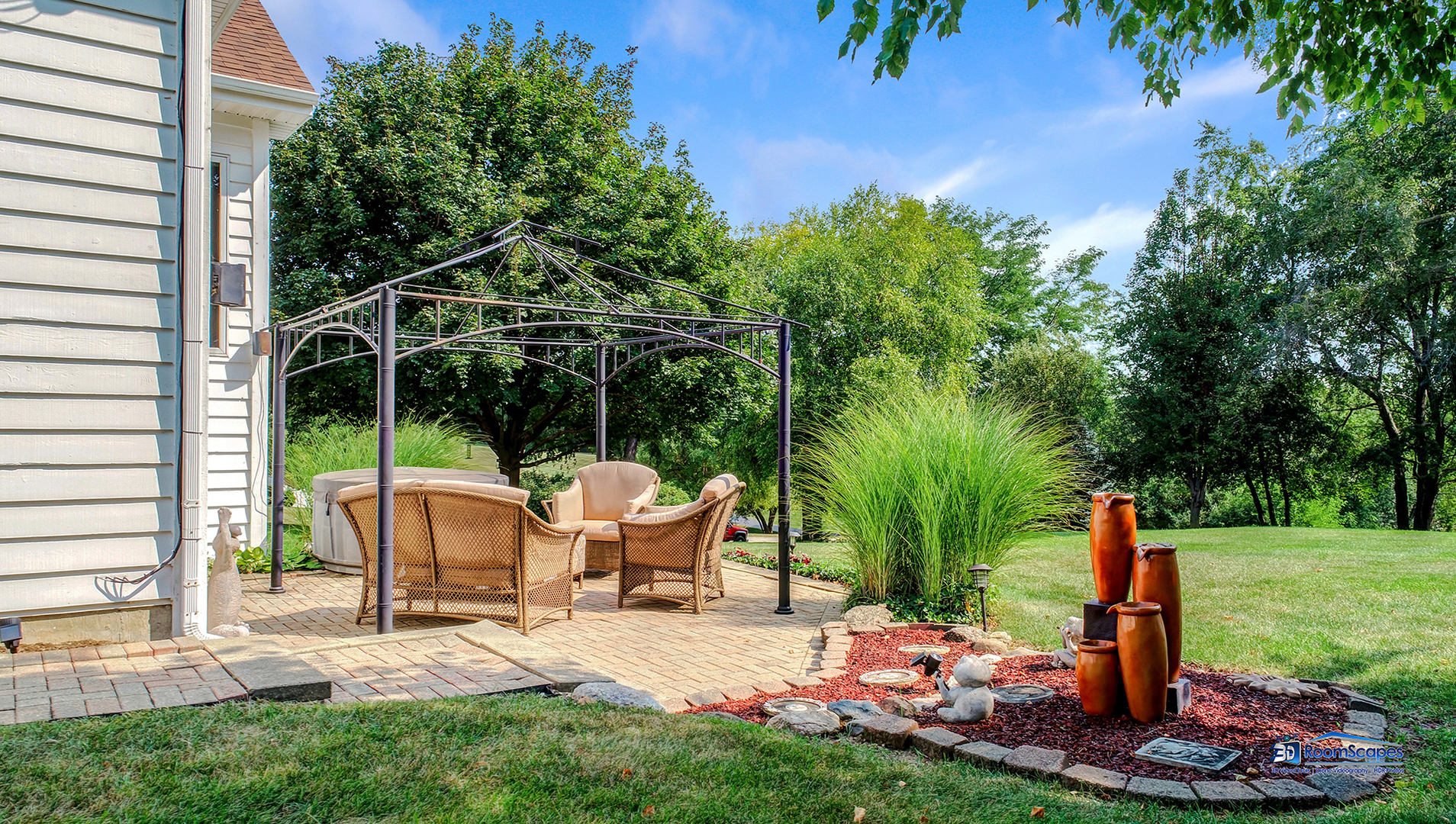 7202 Lone Oak Road Spring Grove, IL 60081 - Photo 44 of 59 a view of a patio with table and chairs potted plants and palm tree