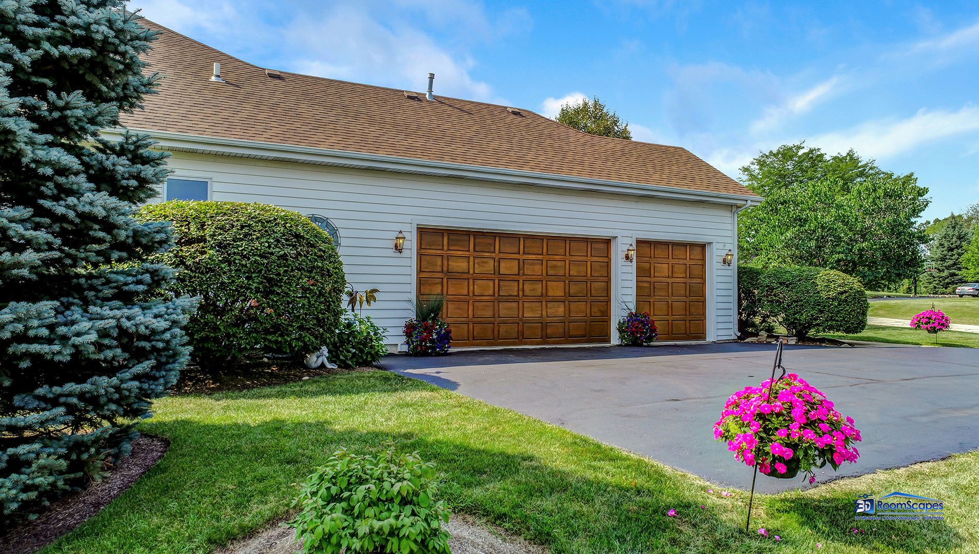 7202 Lone Oak Road Spring Grove, IL 60081 - Photo 50 of 59 a flower garden is sitting in front of a house