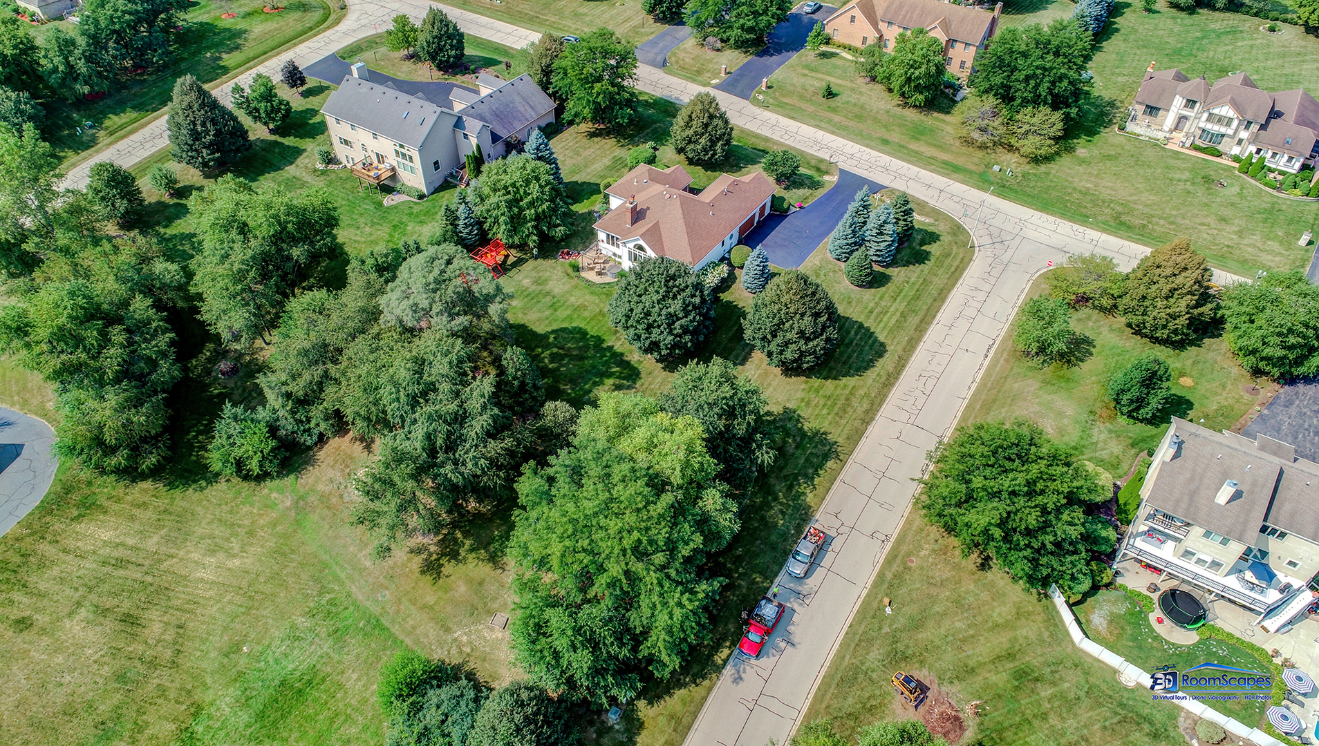 7202 Lone Oak Road Spring Grove, IL 60081 - Photo 56 of 59 an aerial view of residential house with outdoor space and trees all around
