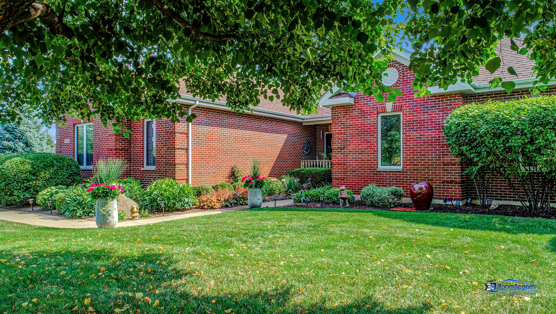 7202 Lone Oak Road Spring Grove, IL 60081 - Photo 7 of 59 a front view of a house with garden