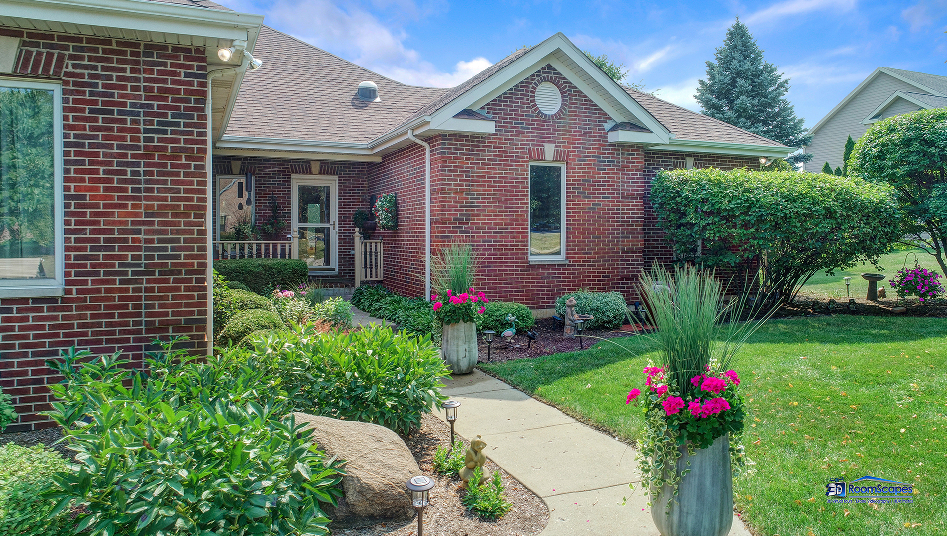 7202 Lone Oak Road Spring Grove, IL 60081 - Photo 8 of 59 a front view of a house with a yard and fountain
