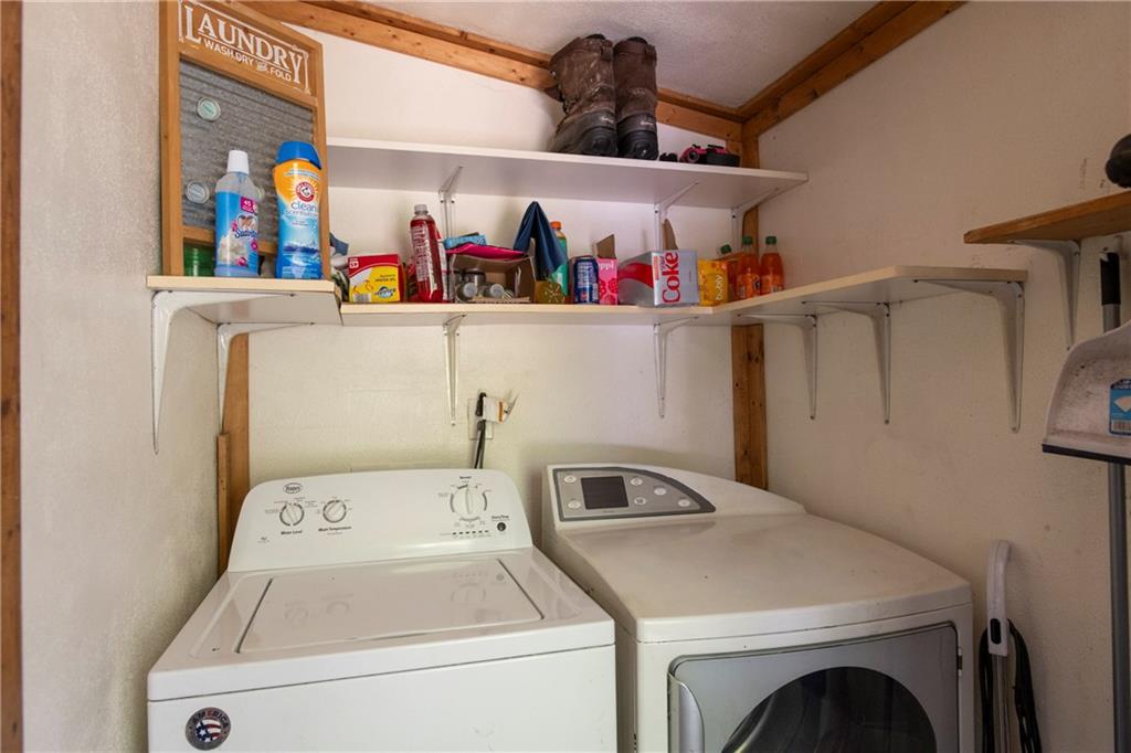9133 South Watson Run Road Meadville, PA 16335 - Photo 30 of 45 a utility room with dryer and washer