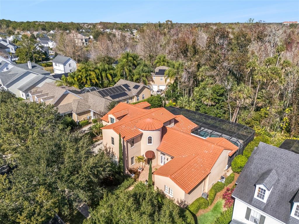 799 Oak Shadows Road Celebration, FL 34747 - Photo 53 of 97 an aerial view of a house with a yard