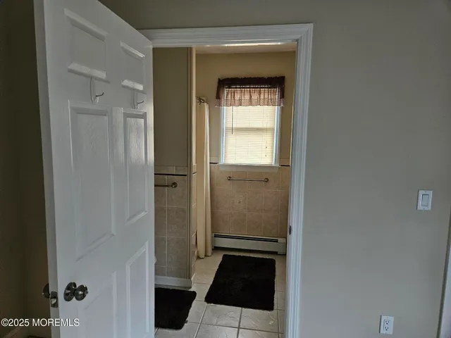 a bathroom with a sink and a shower