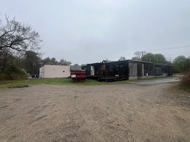 a view of a car in front of a house