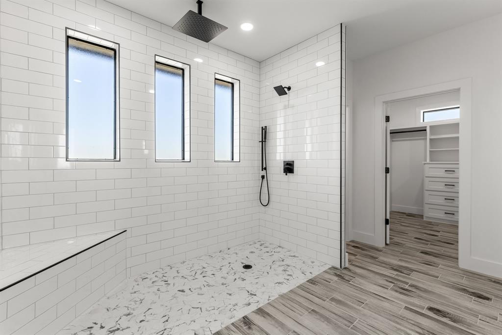 2311 Parker Road Wichita Falls, TX 76310 - Photo 22 of 32 a bathroom with a shower and a glass door