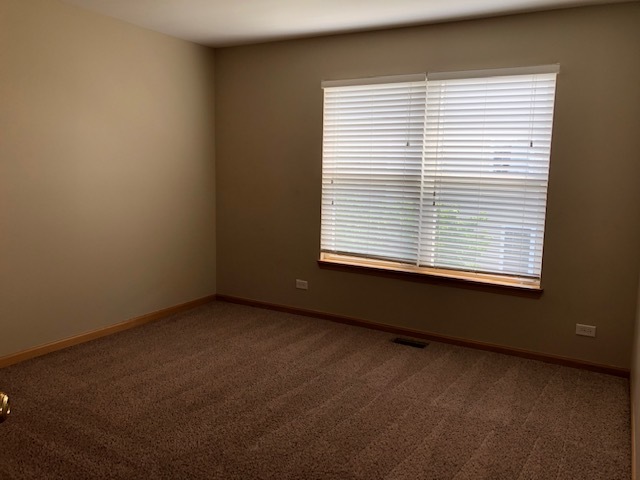 2845 Berman Road North Aurora, IL 60542 - Photo 14 of 23 an empty room with a window