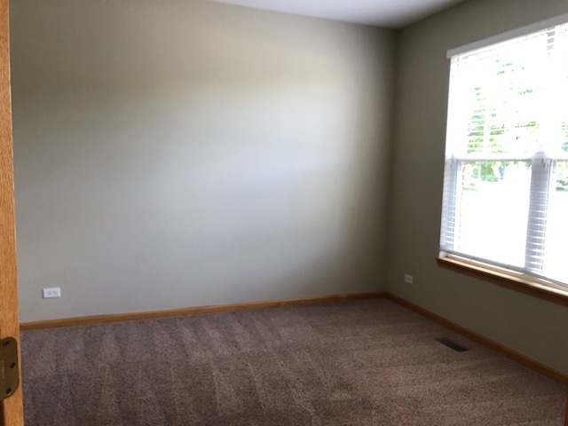 2845 Berman Road North Aurora, IL 60542 - Photo 4 of 23 an empty room with a window