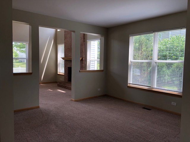 2845 Berman Road North Aurora, IL 60542 - Photo 5 of 23 an empty room with windows