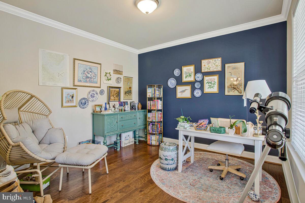 54 Simmons Ridge Road Prince Frederick, MD 20678 - Photo 7 of 55 a living room with furniture and wooden floor
