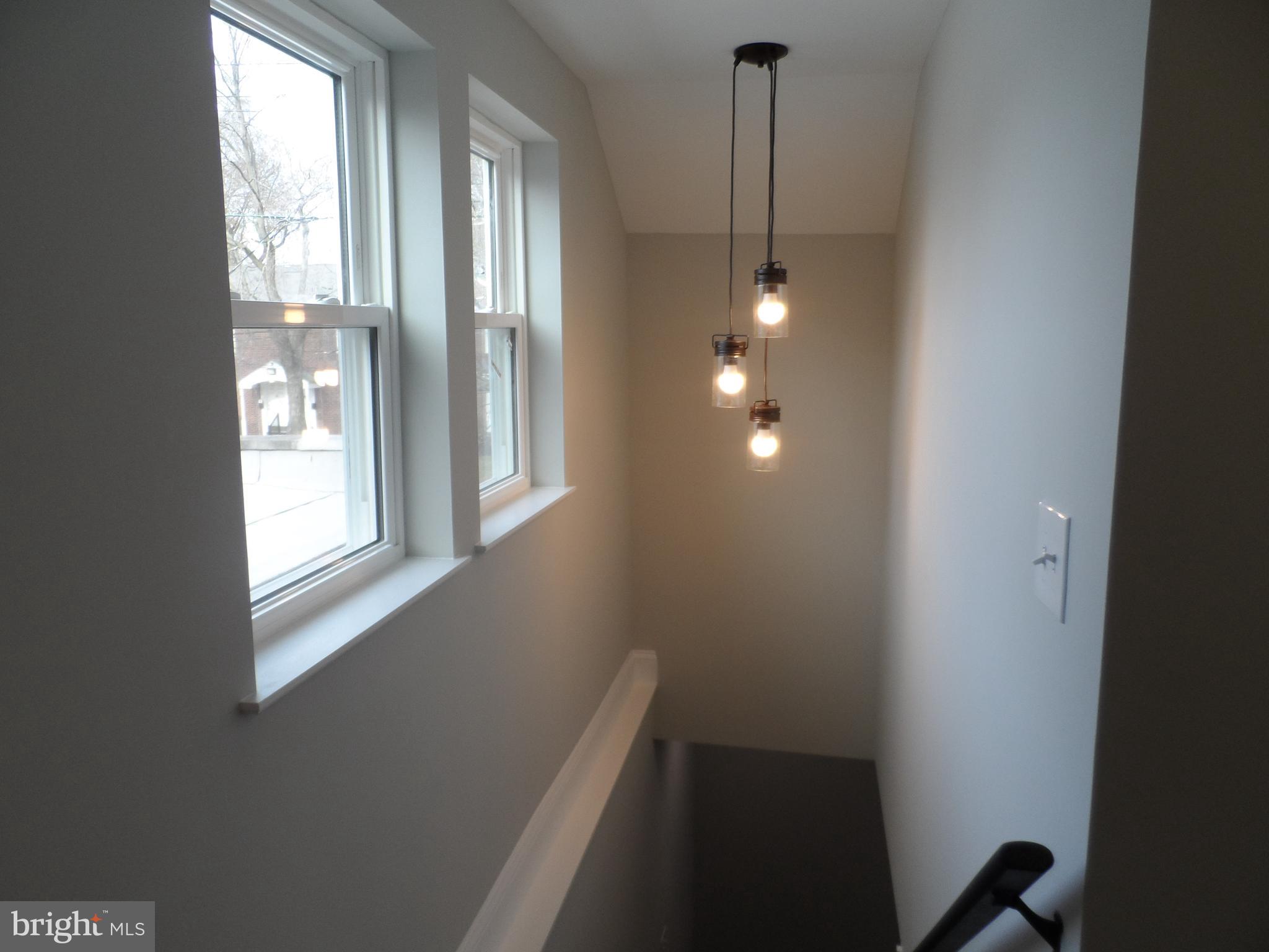 1335 Nottingham Way Hamilton, NJ 08609 - Photo 19 of 40 a view of an empty room with windows