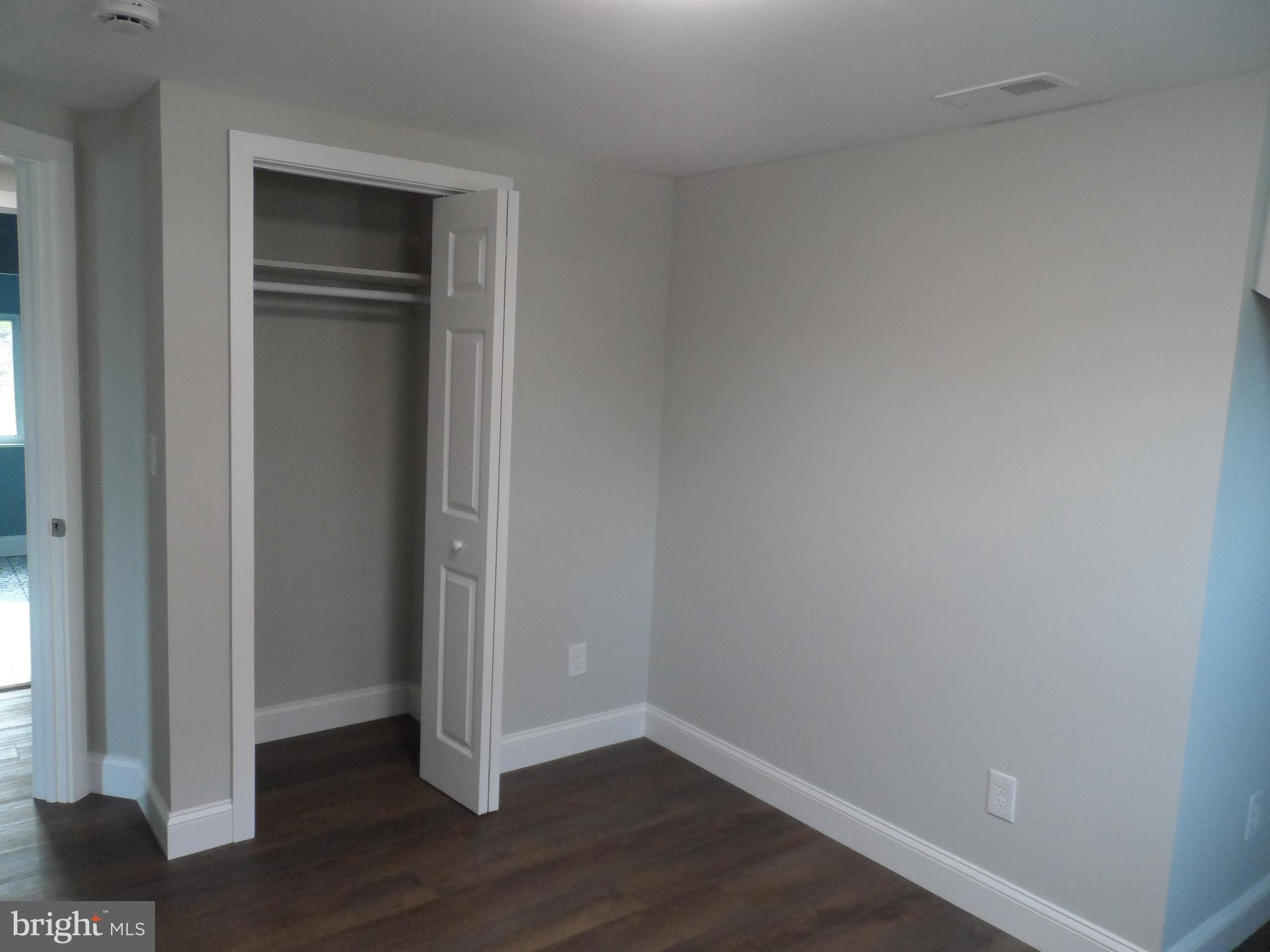 1335 Nottingham Way Hamilton, NJ 08609 - Photo 25 of 40 a view of empty room with wooden floor