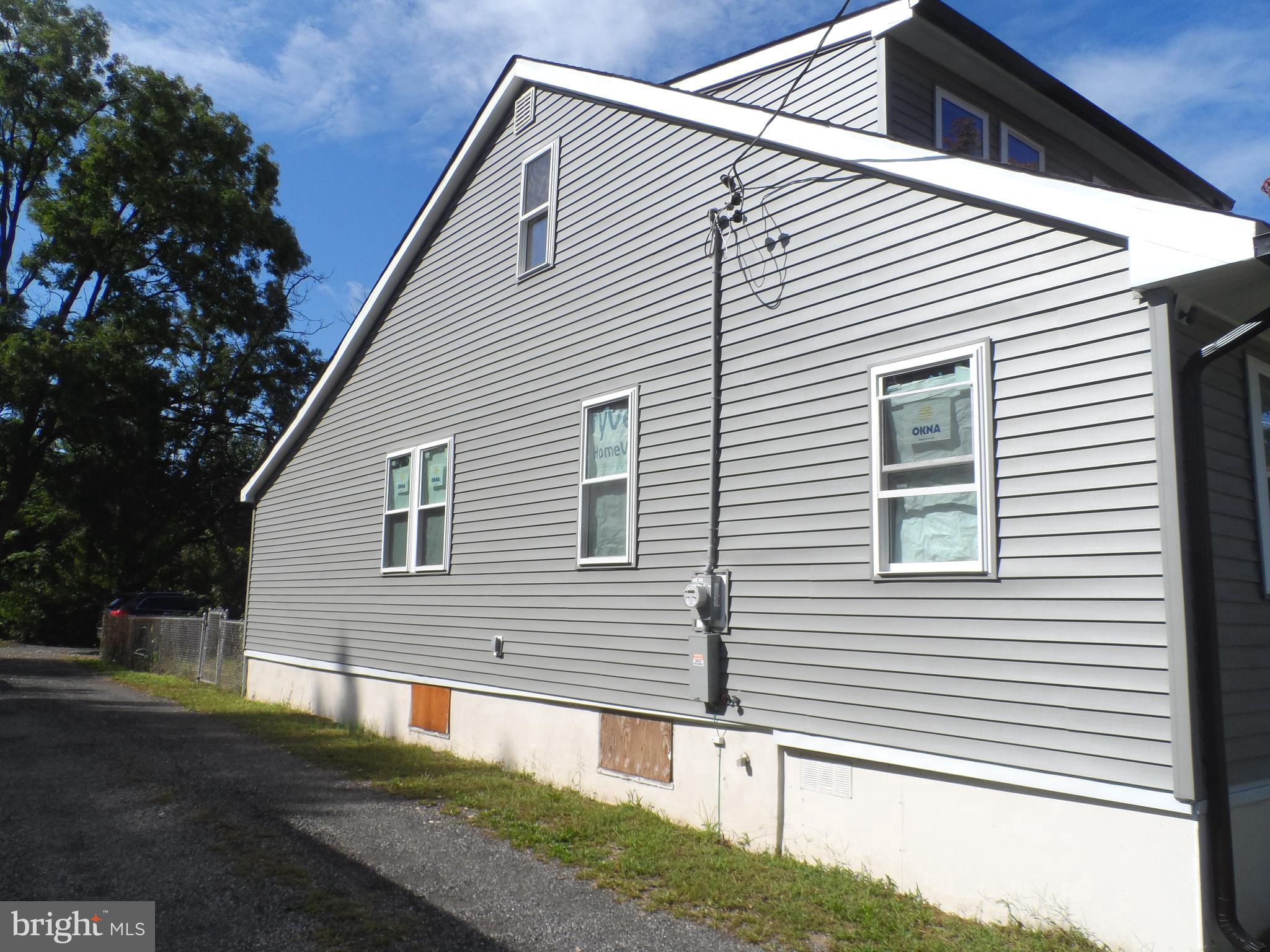 1335 Nottingham Way Hamilton, NJ 08609 - Photo 3 of 40 a view of a house with a yard