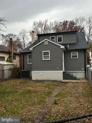 a house with yard in front of it
