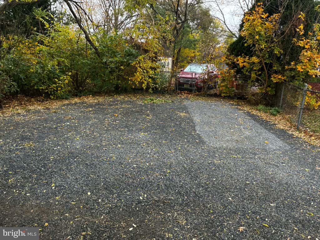 1335 Nottingham Way Hamilton, NJ 08609 - Photo 39 of 40 a view of a house with a trees