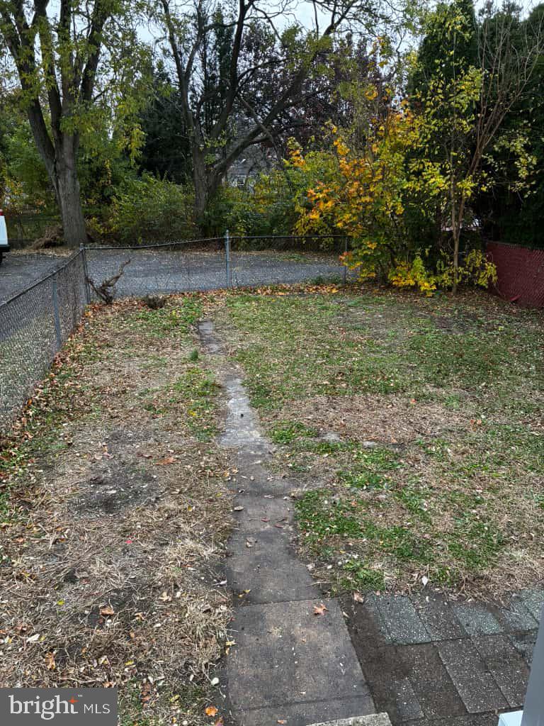 1335 Nottingham Way Hamilton, NJ 08609 - Photo 40 of 40 a view of a yard with trees