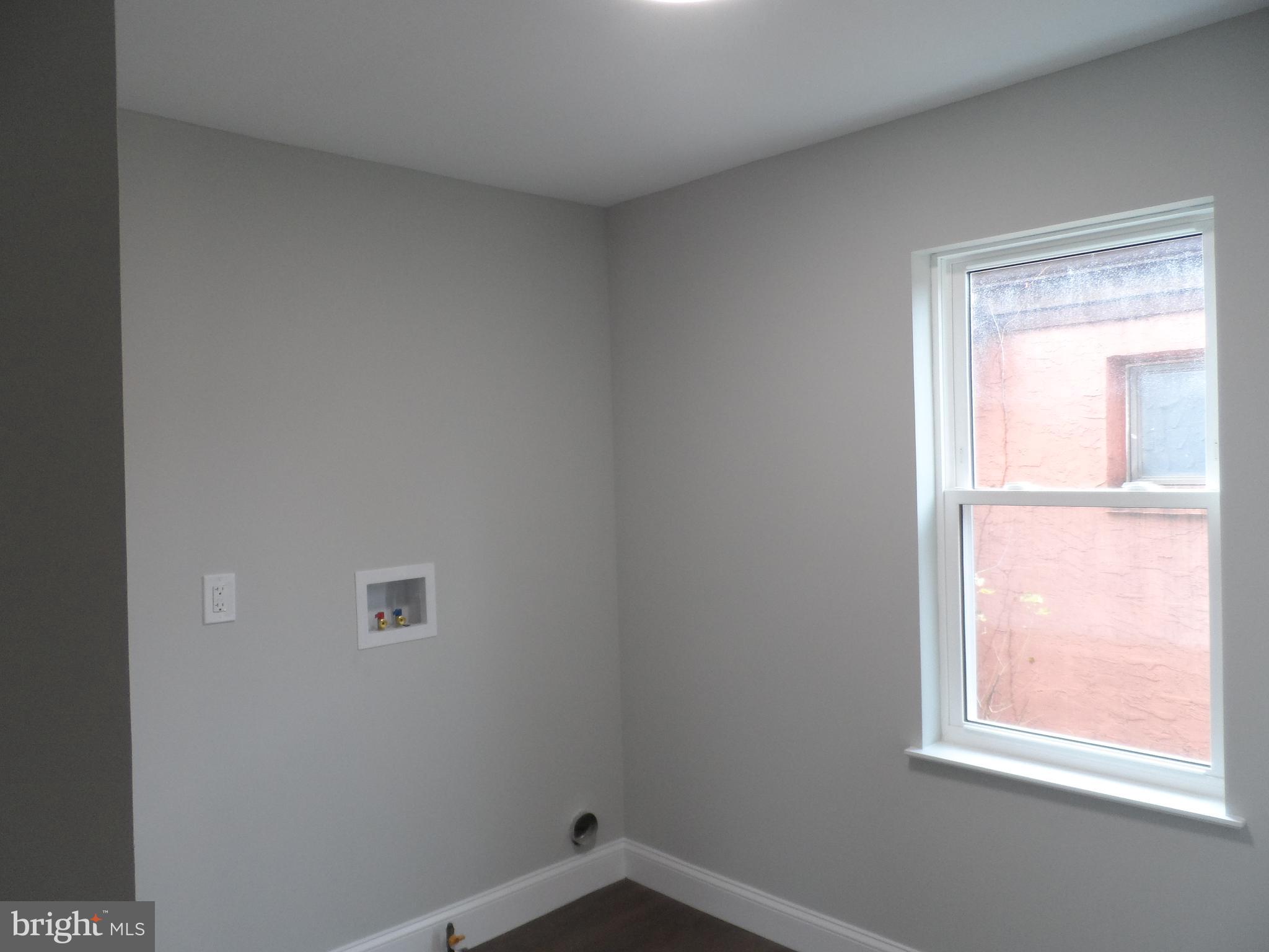 1335 Nottingham Way Hamilton, NJ 08609 - Photo 10 of 40 an empty room with a window