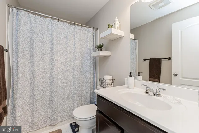 a view of a workspace with furniture