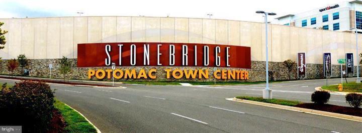 4336 Potomac Highlands Circle, Unit 51 Triangle, VA 22172 - Photo 35 of 40 a sign on the side of a road