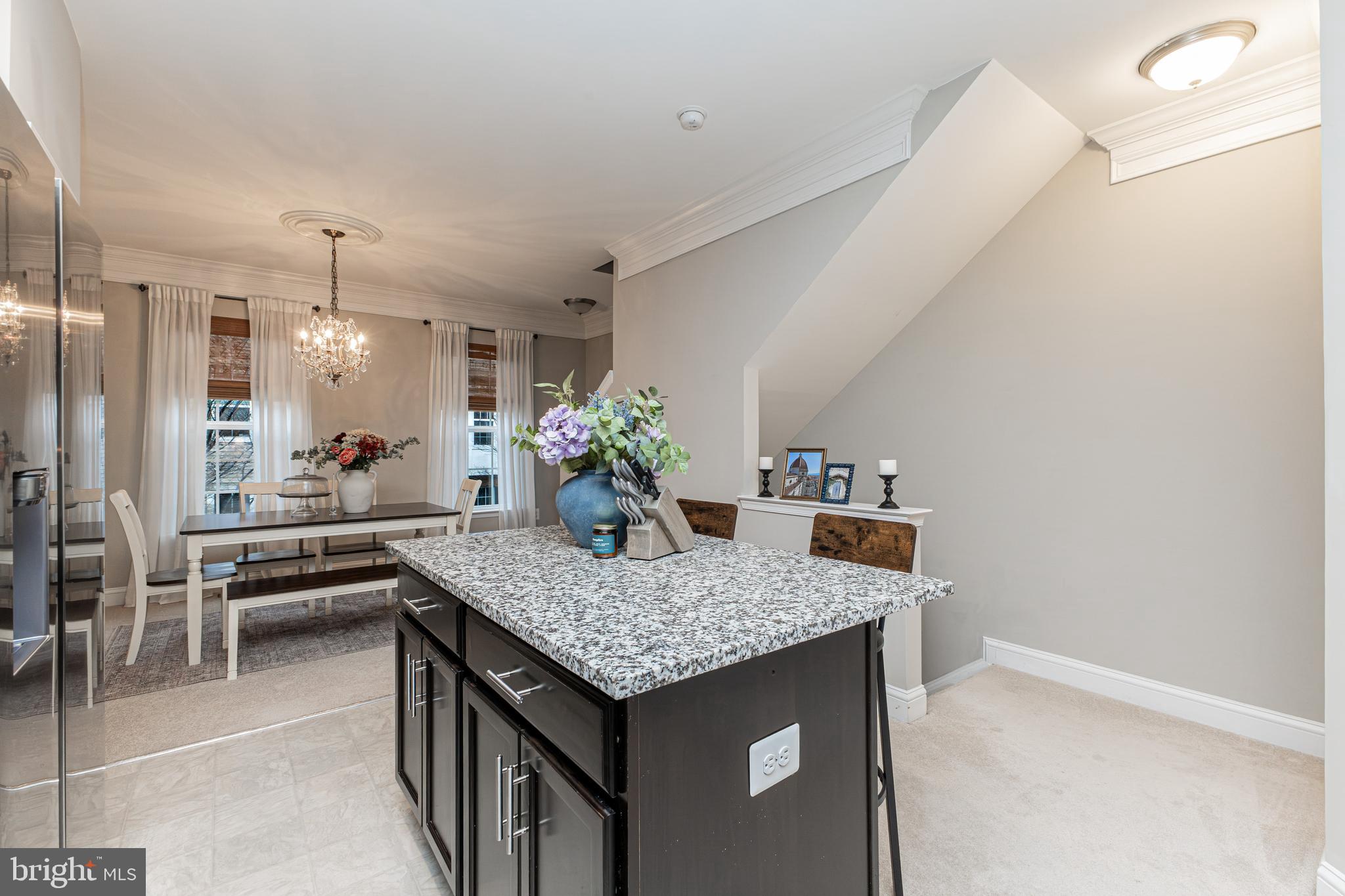 4336 Potomac Highlands Circle, Unit 51 Triangle, VA 22172 - Photo 10 of 40 a dining hall with granite countertop a sink dishwasher a dining table and chairs with wooden floor