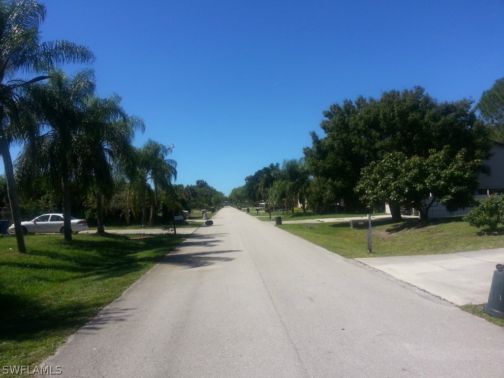 8433 Wren Road Fort Myers, FL 33967 - Photo 6 of 6 a view of a park with large trees