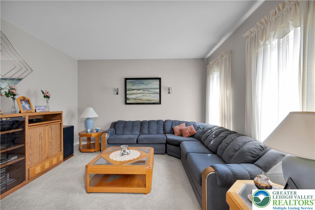 5920 Michael's Crossing Orefield, PA 18069 - Photo 11 of 31 a living room with furniture and a window