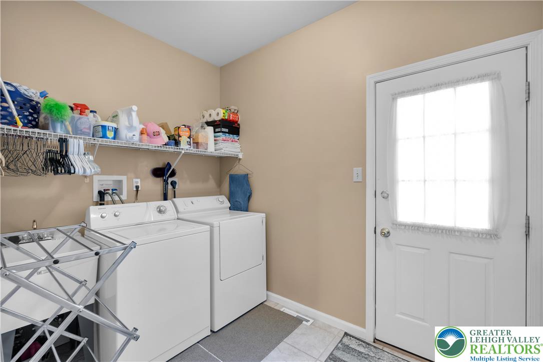 5920 Michael's Crossing Orefield, PA 18069 - Photo 17 of 31 a utility room with dryer and washer