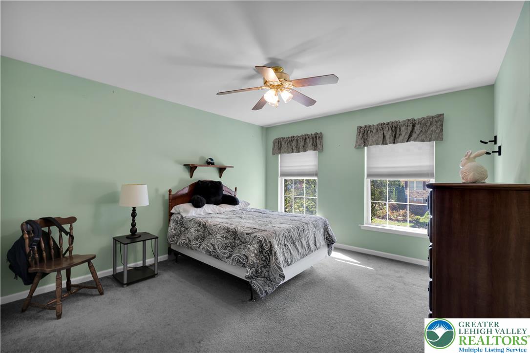 5920 Michael's Crossing Orefield, PA 18069 - Photo 26 of 31 a bedroom with a bed and a window