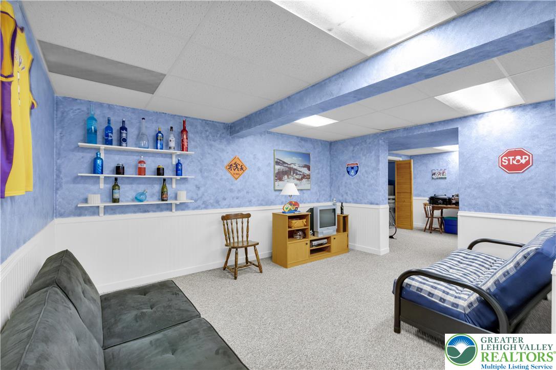 5920 Michael's Crossing Orefield, PA 18069 - Photo 29 of 31 a living room with furniture and a couch