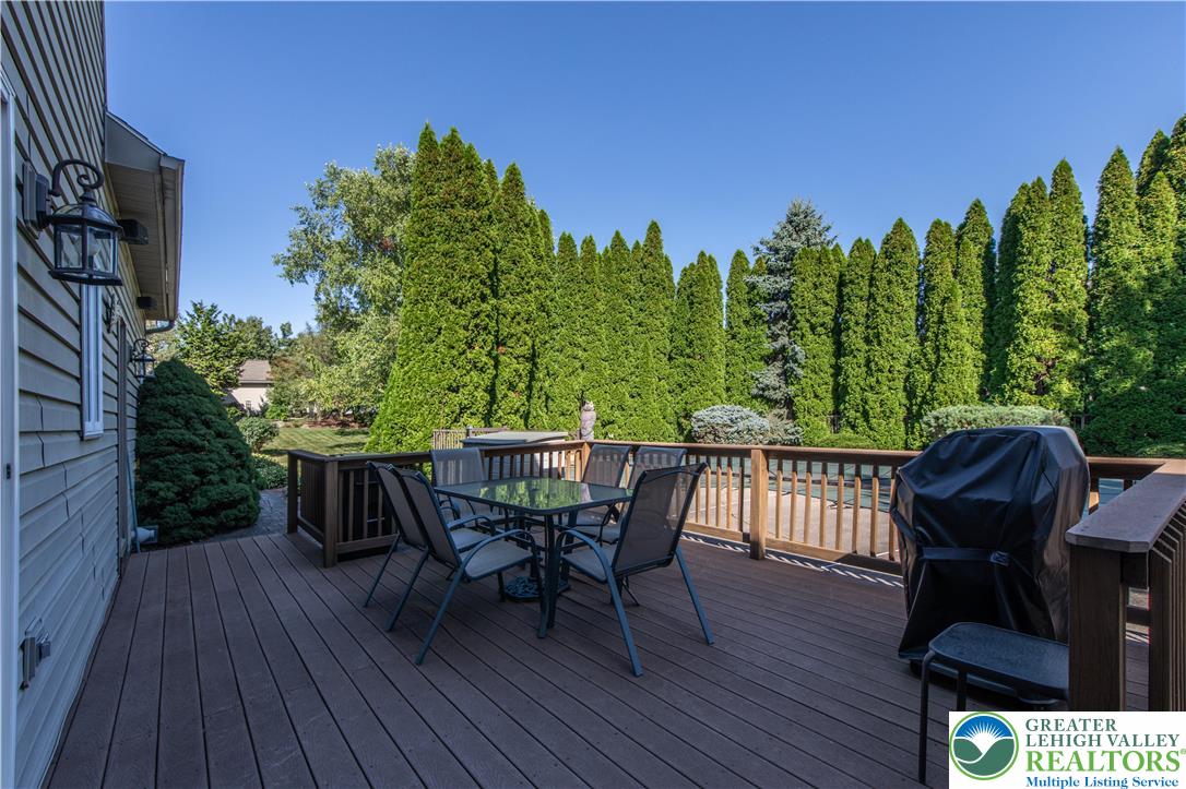 5920 Michael's Crossing Orefield, PA 18069 - Photo 4 of 31 a view of a chairs and table on the deck