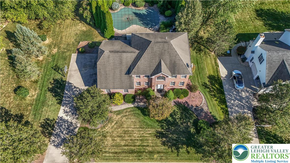 5920 Michael's Crossing Orefield, PA 18069 - Photo 8 of 31 an aerial view of a house with garden space and trees