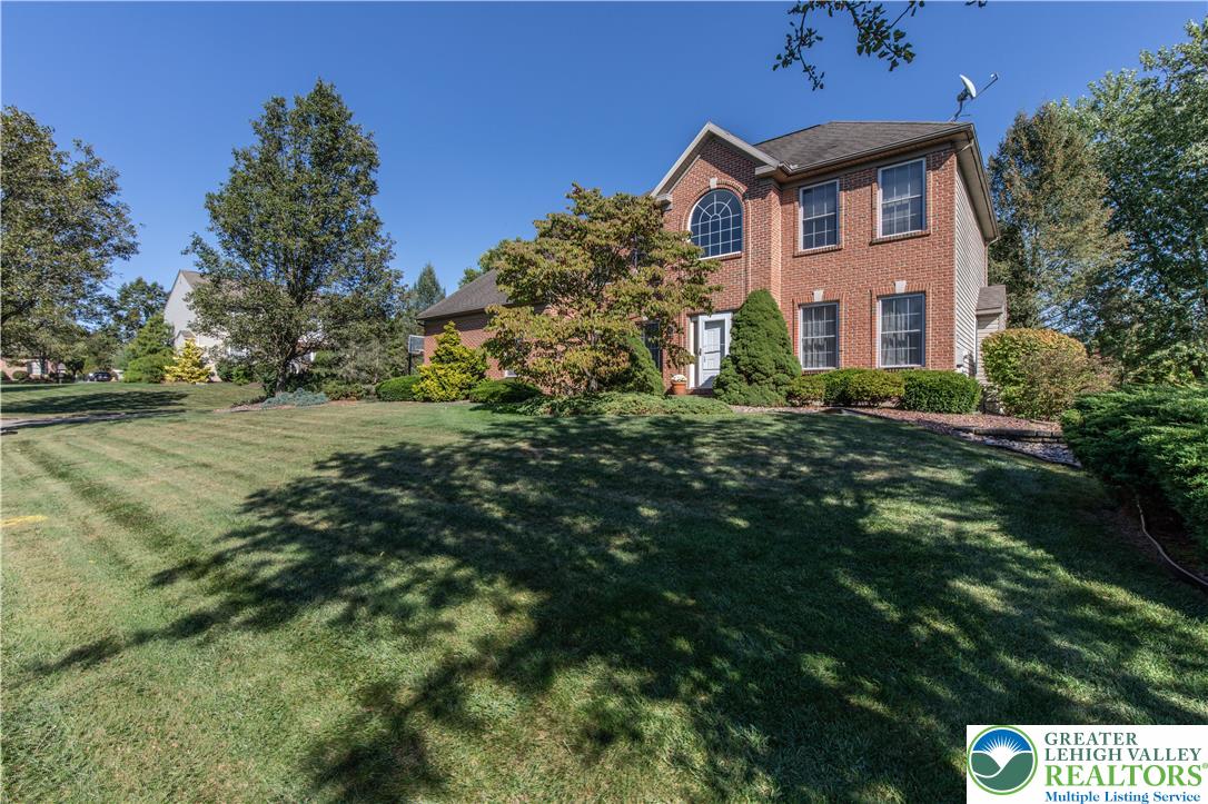 5920 Michael's Crossing Orefield, PA 18069 - Photo 9 of 31 a front view of a house with a yard