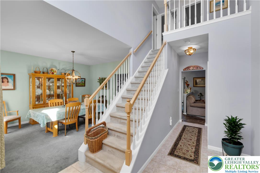 5920 Michael's Crossing Orefield, PA 18069 - Photo 10 of 31 a view of hall way with furniture and staircase