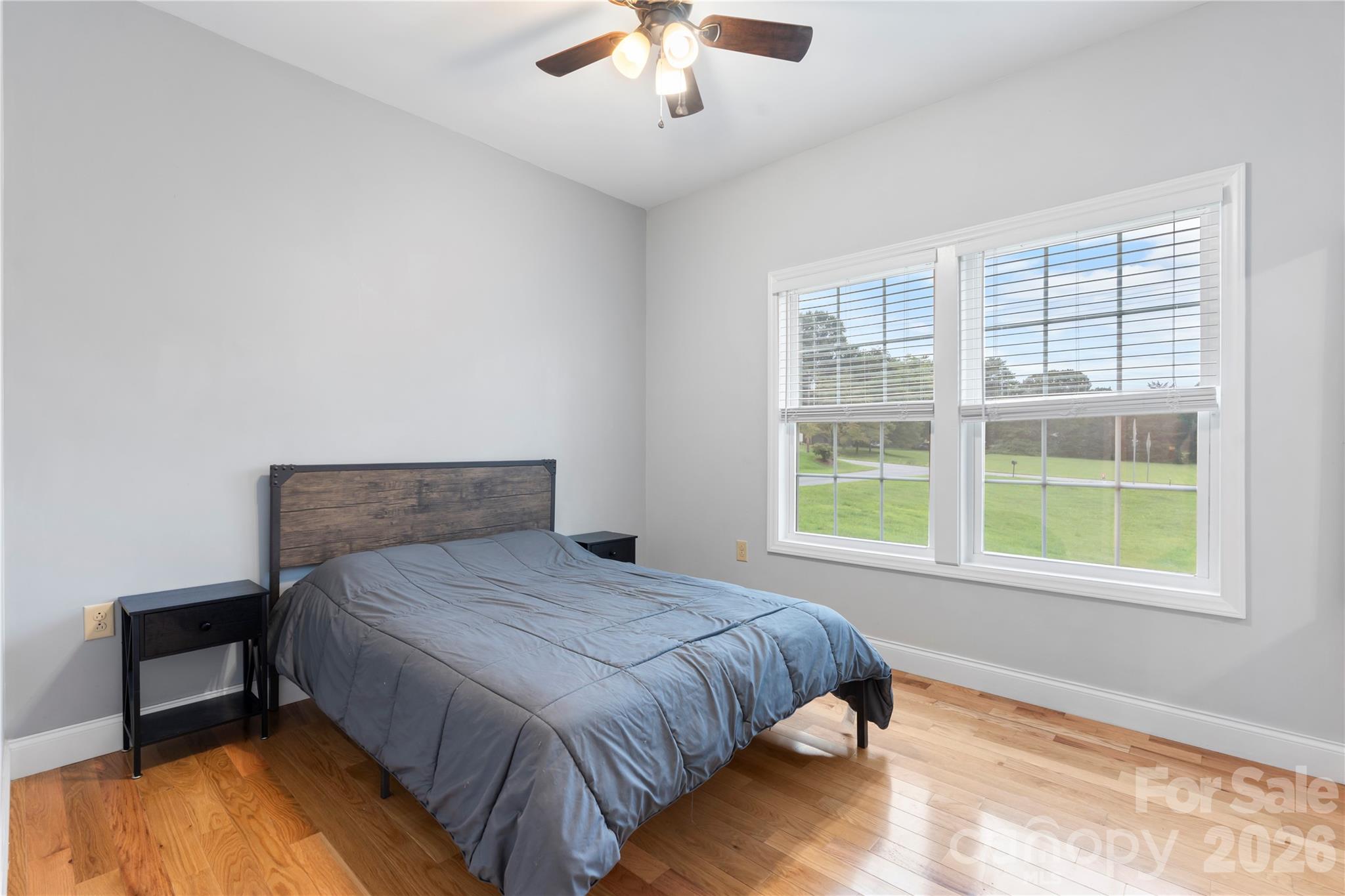 111 Pinewood Road Granite Falls, NC 28630 - Photo 19 of 33 a bedroom with a bed and a window